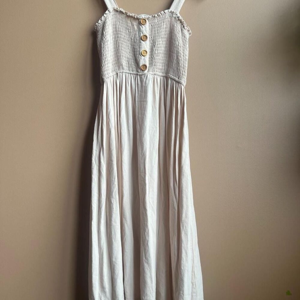 Ava James beige midi dress with smocked bust, lettuce hem, and buttons. Size M.